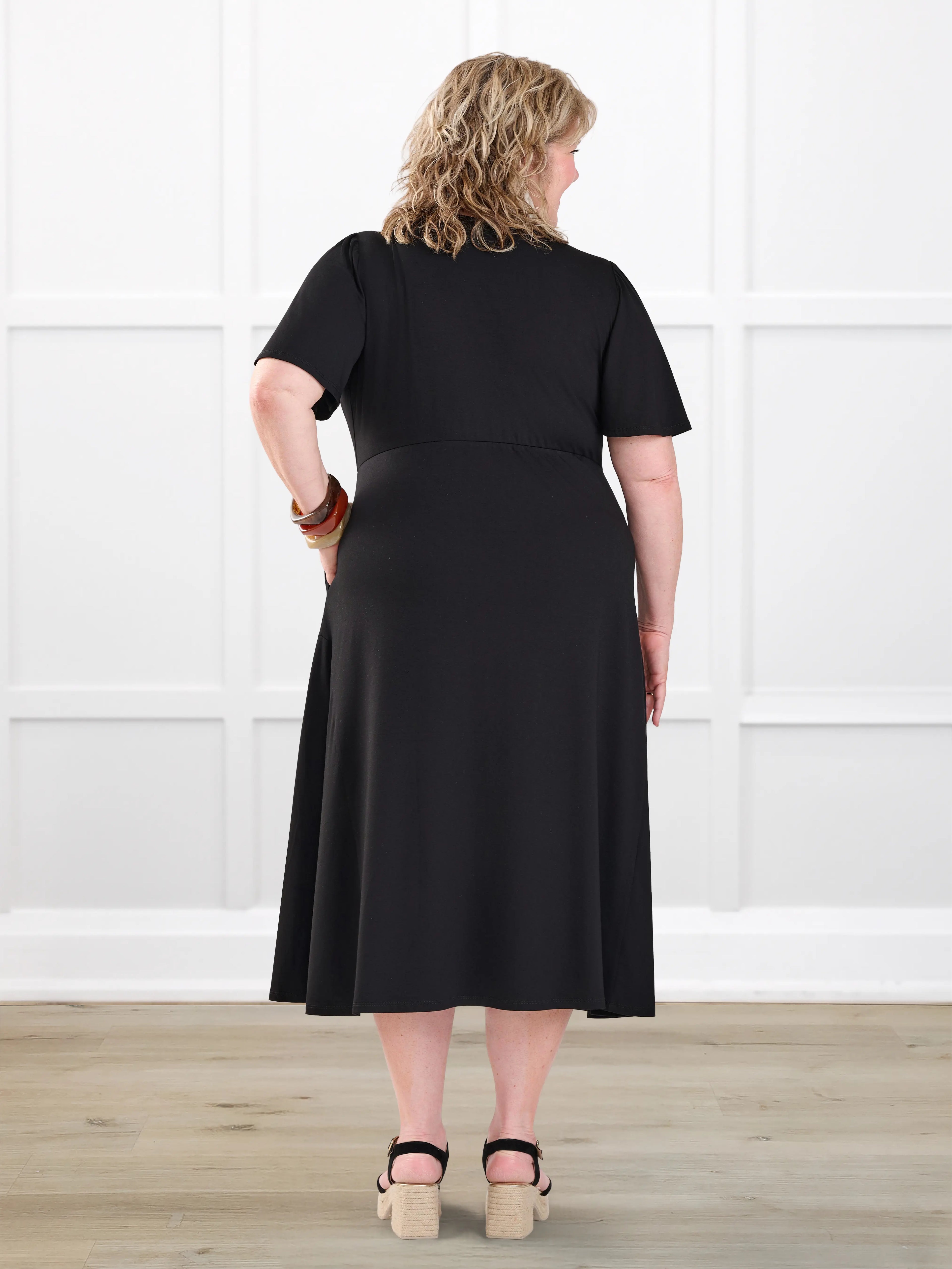 Juliana flutter sleeve midi dress for women in Black on model Kelly, size 3X @Kelly-3x