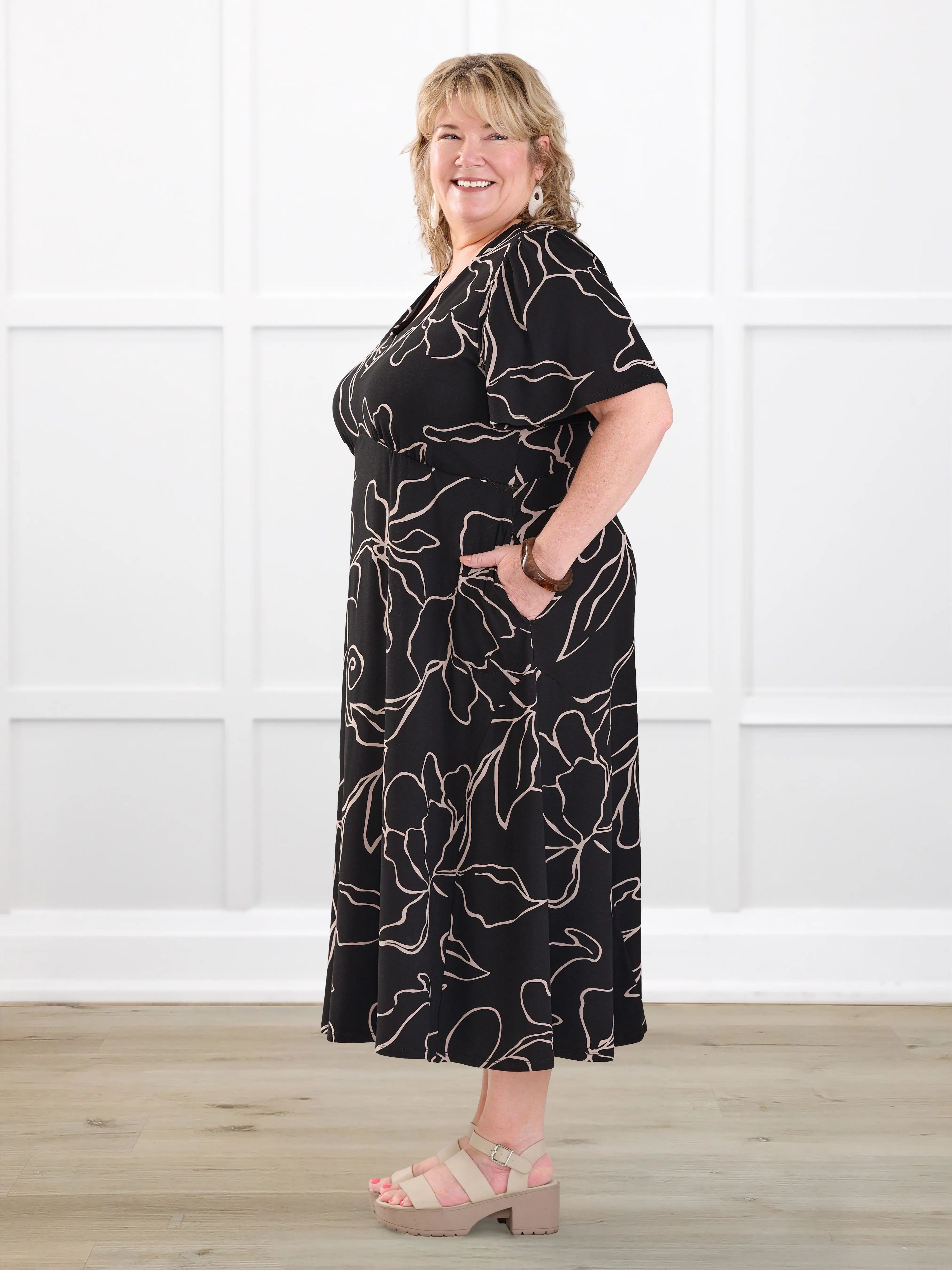 Juliana flutter sleeve midi dress for women in Contour floral on model Kelly, size 3X @Kelly-3x