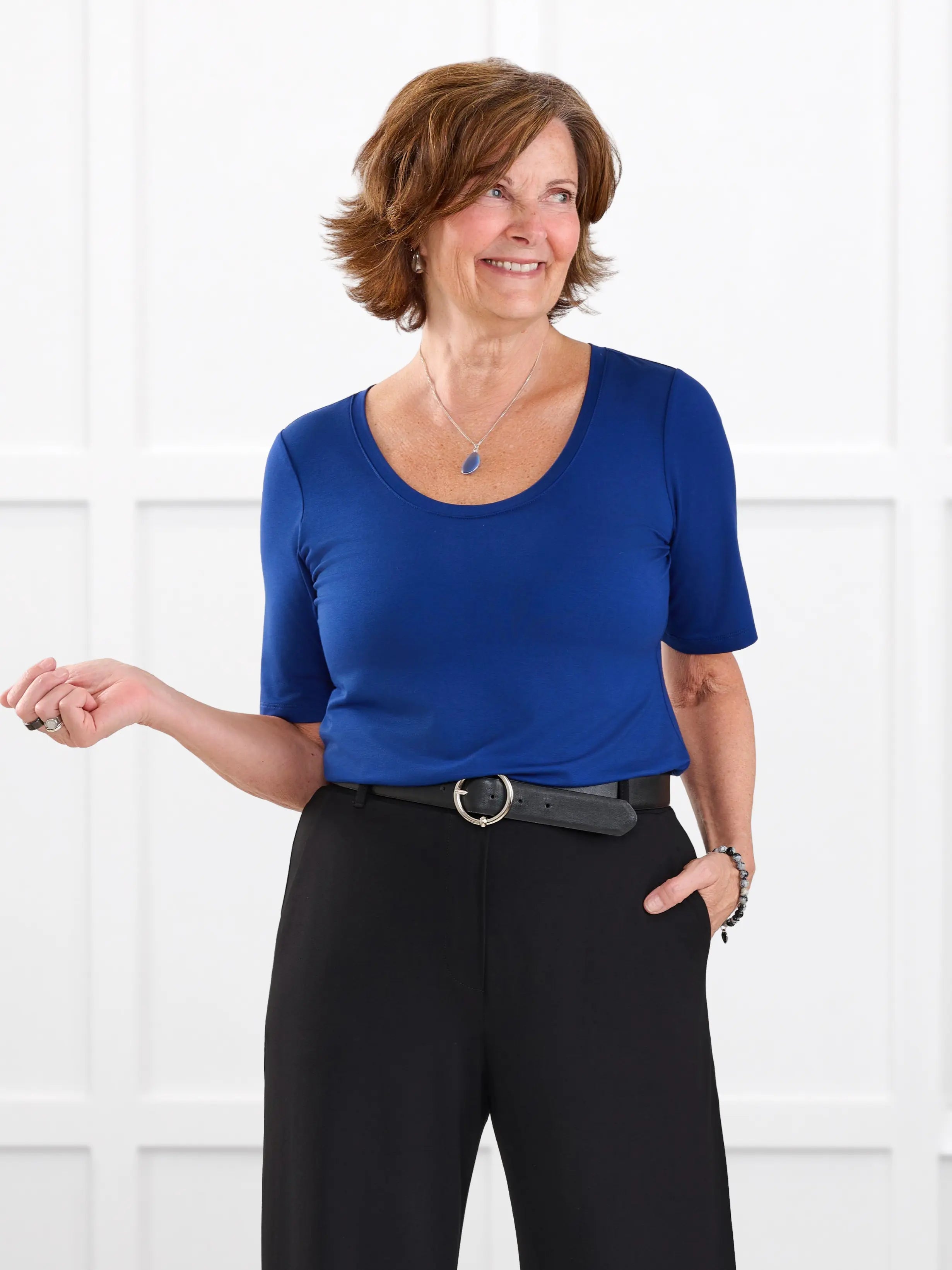 Julita scoop neck half sleeve tee for women in Ink blue on model Donna, size S @Donna-S