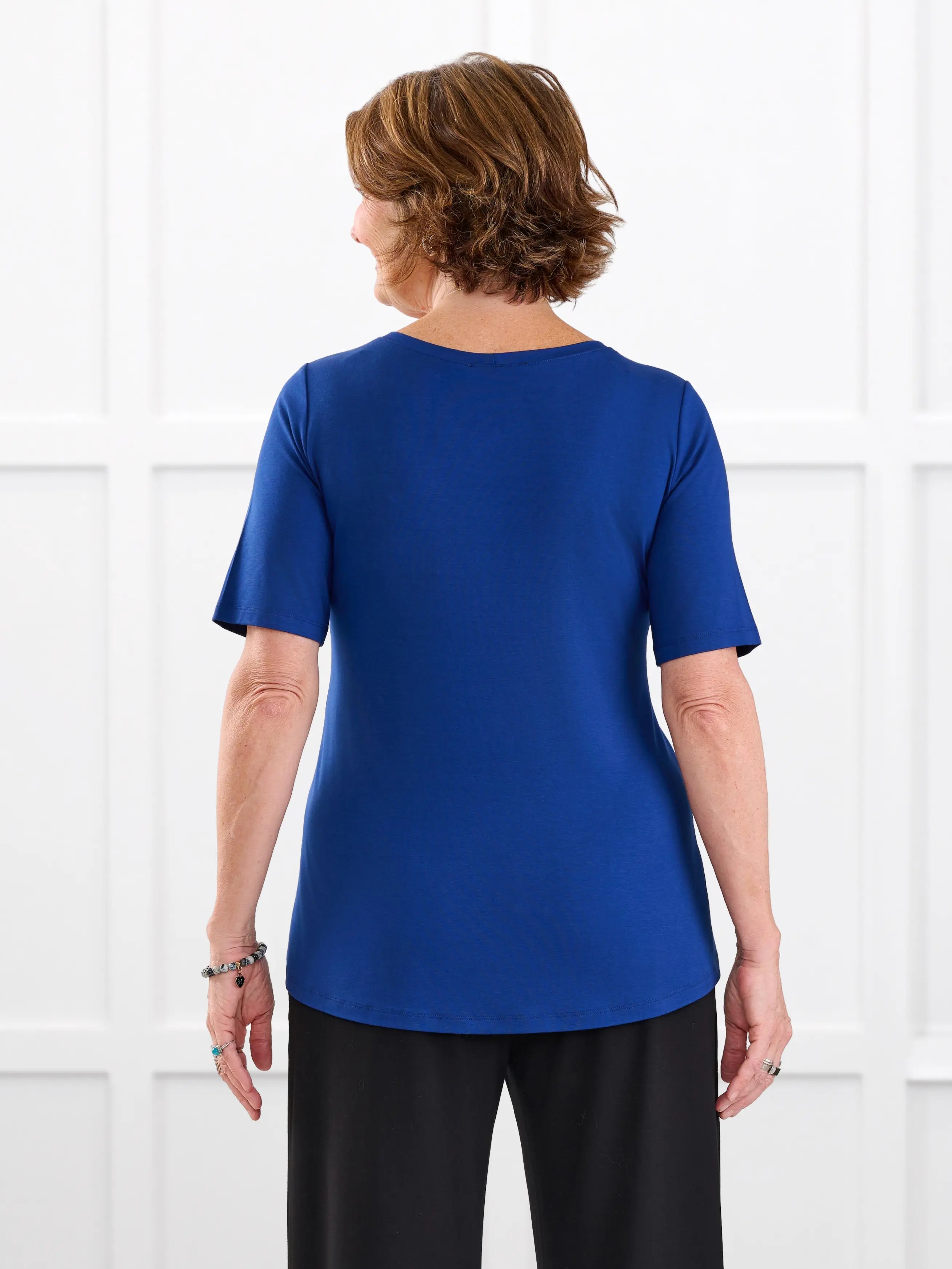 Julita scoop neck half sleeve tee for women in Ink blue on model Donna, size S @Donna-S