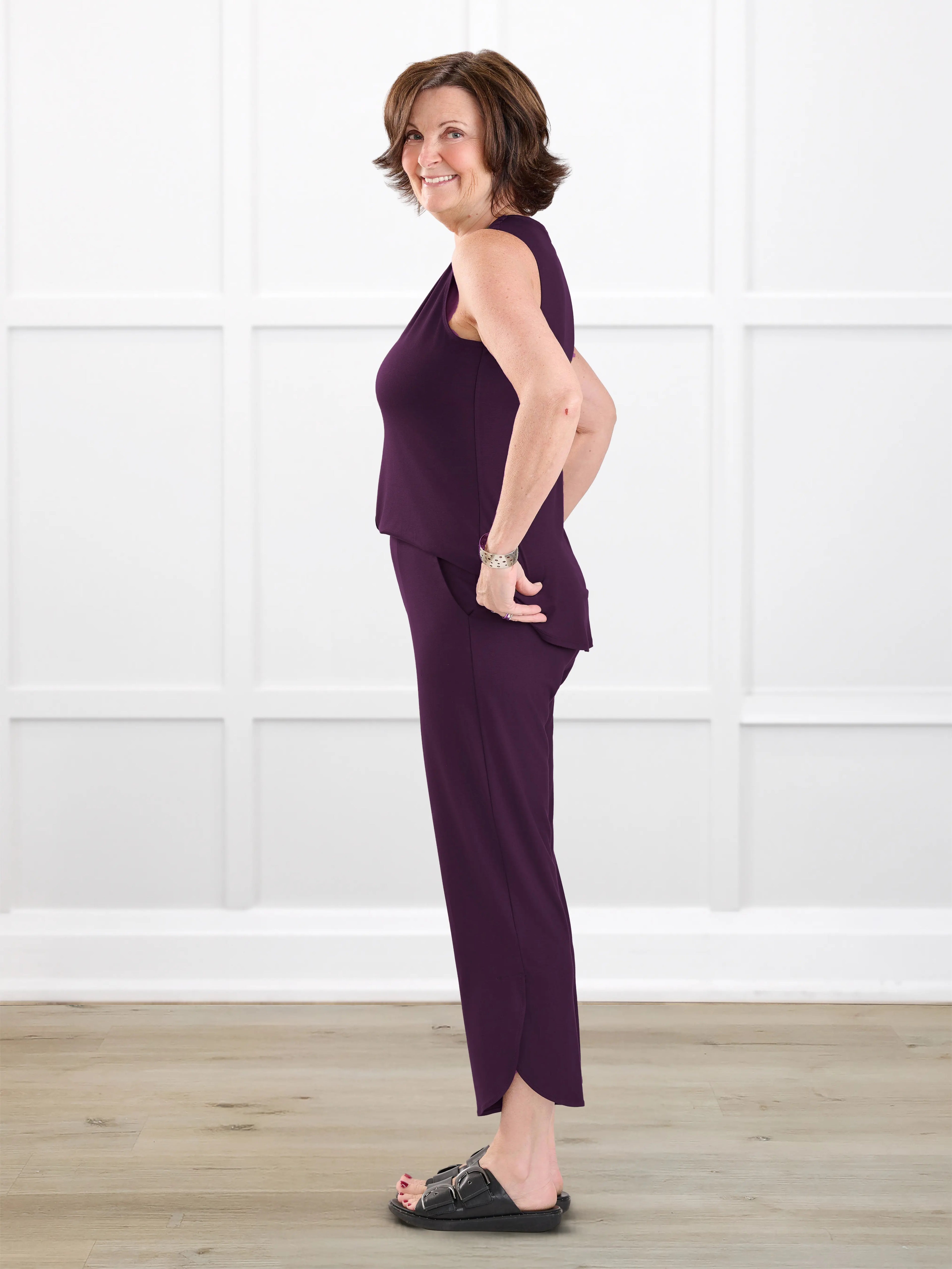 Juna open back dressy capri jumpsuit for women in Port on model Donna, size S @Donna-S