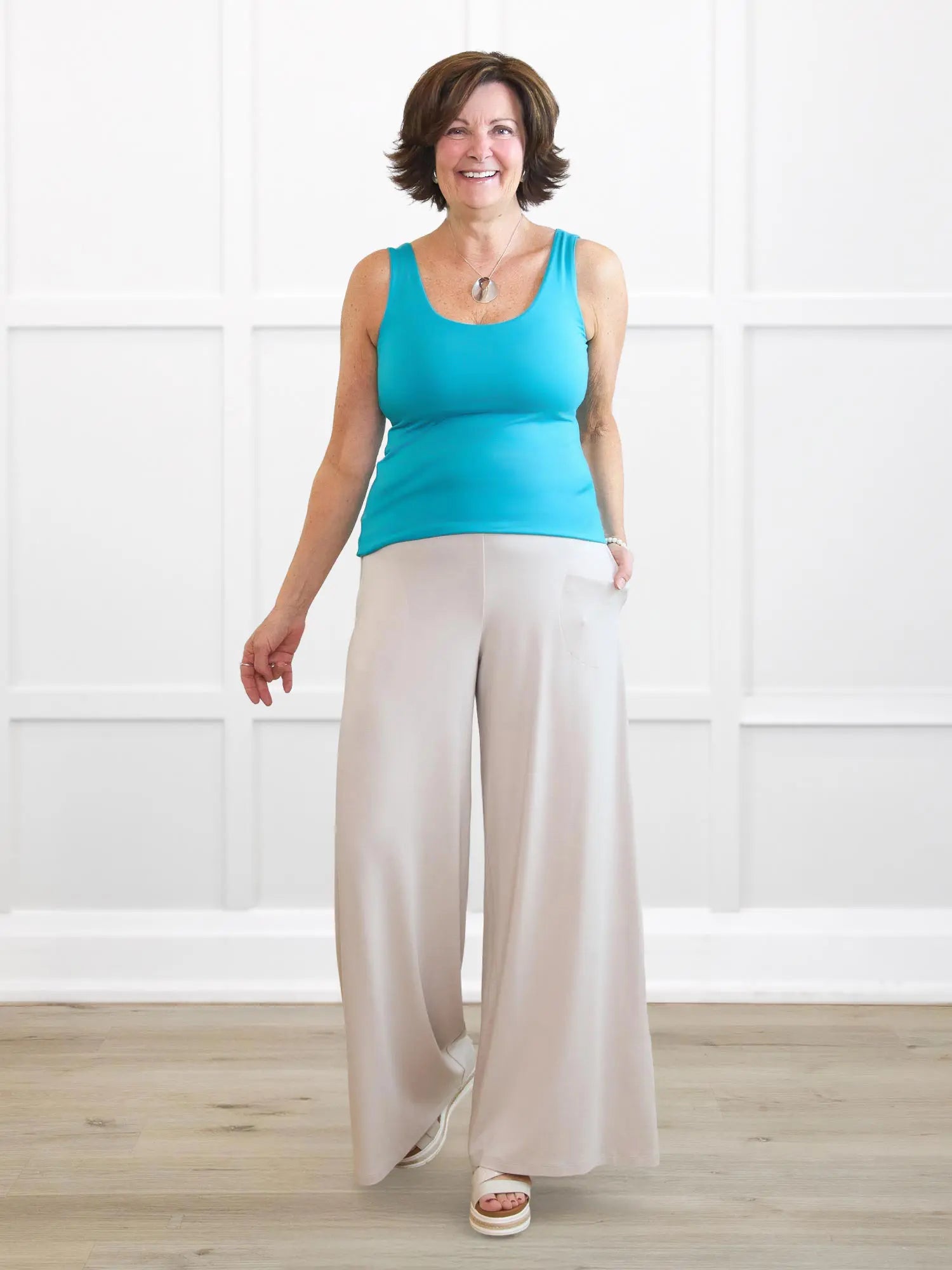 Kaleo high waisted wide leg pant for women 00 in Sandstone on model Donna, size S Regular @Donna-S-regular