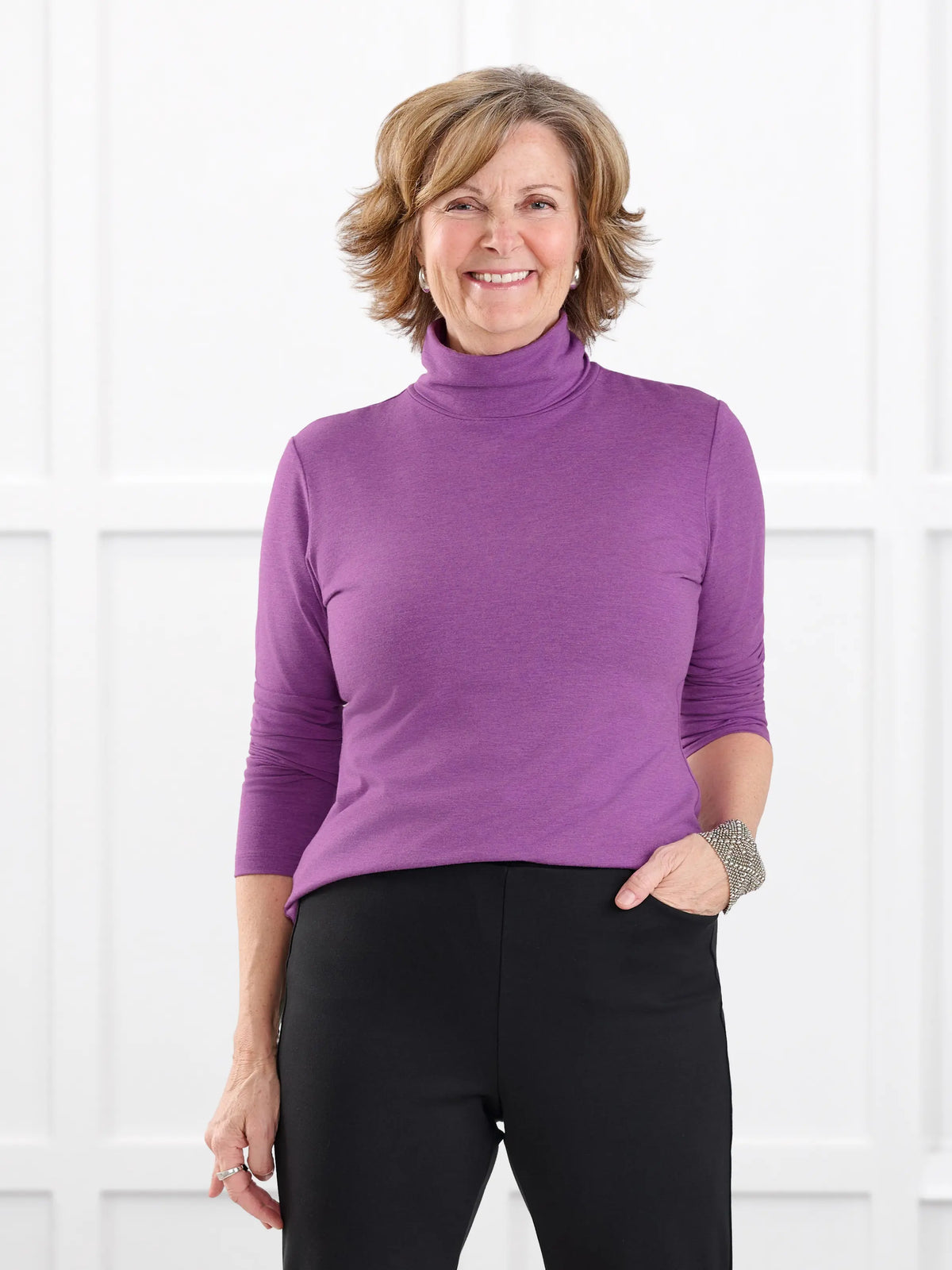 Kerry turtleneck top for women in Lupin melange on model Donna, size S @Donna-S