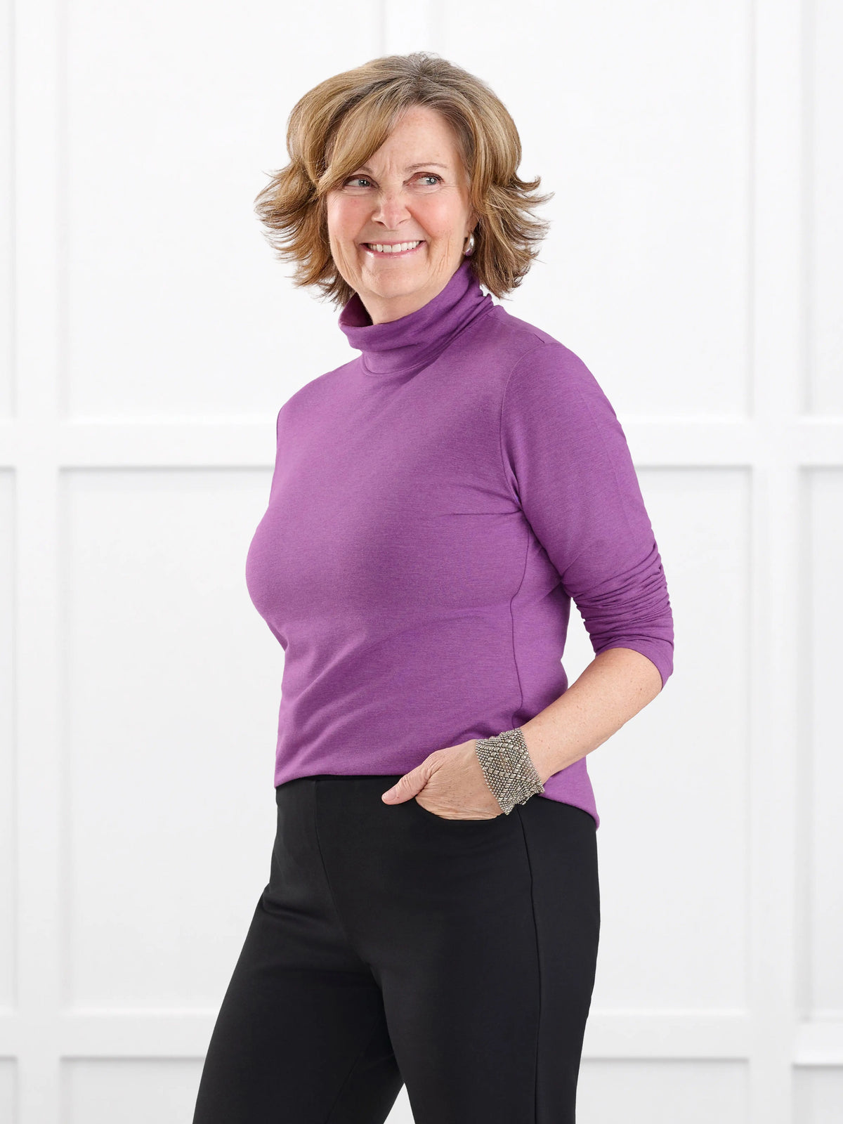 Kerry turtleneck top for women in Lupin melange on model Donna, size S @Donna-S