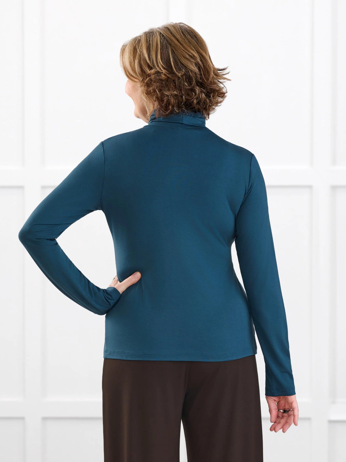 Kerry turtleneck top for women in Atlantic on model Donna, size S @Donna-S