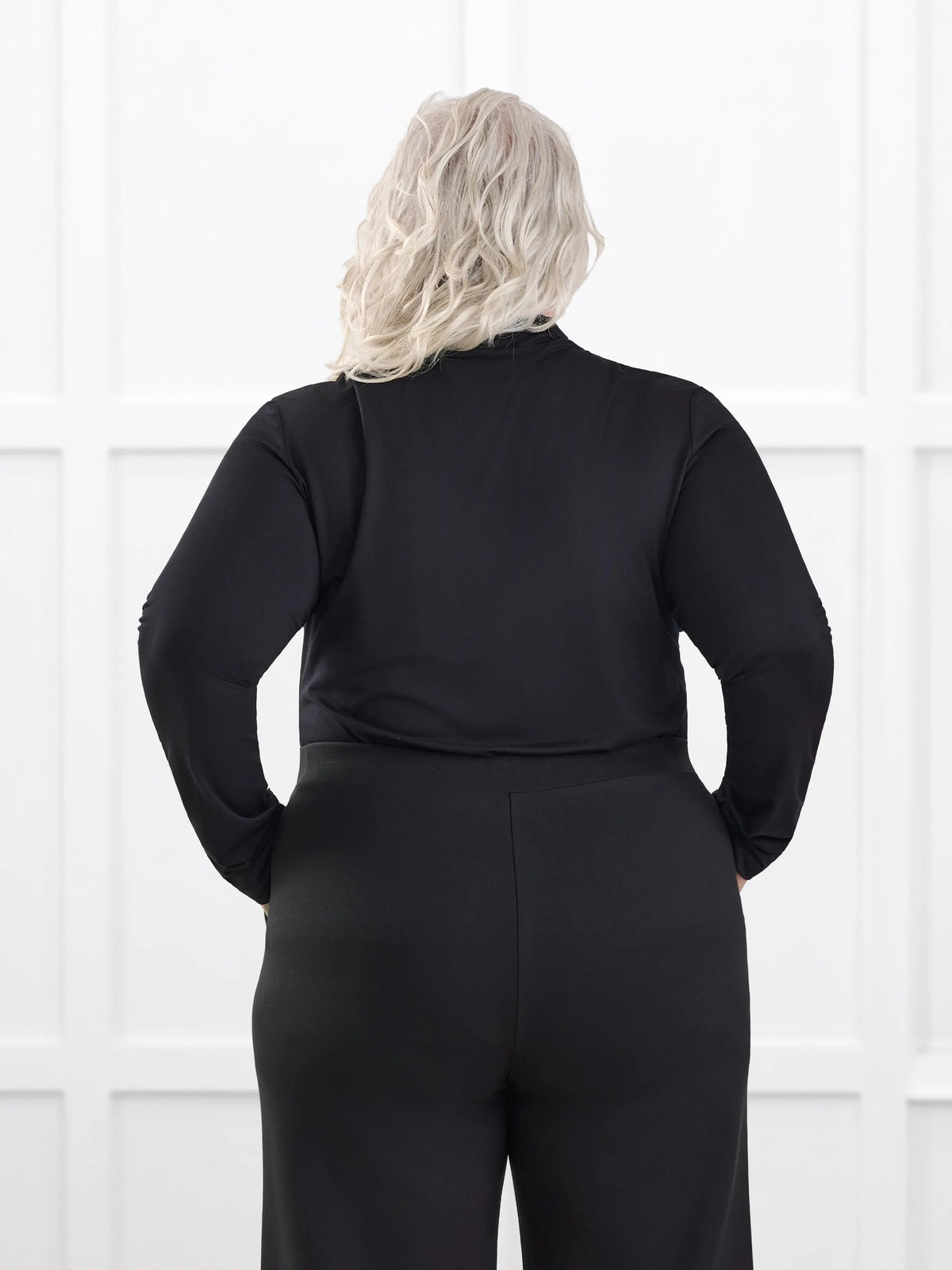Kerry turtleneck top for women in Black on model Colleen, size XXL @Colleen-XXL