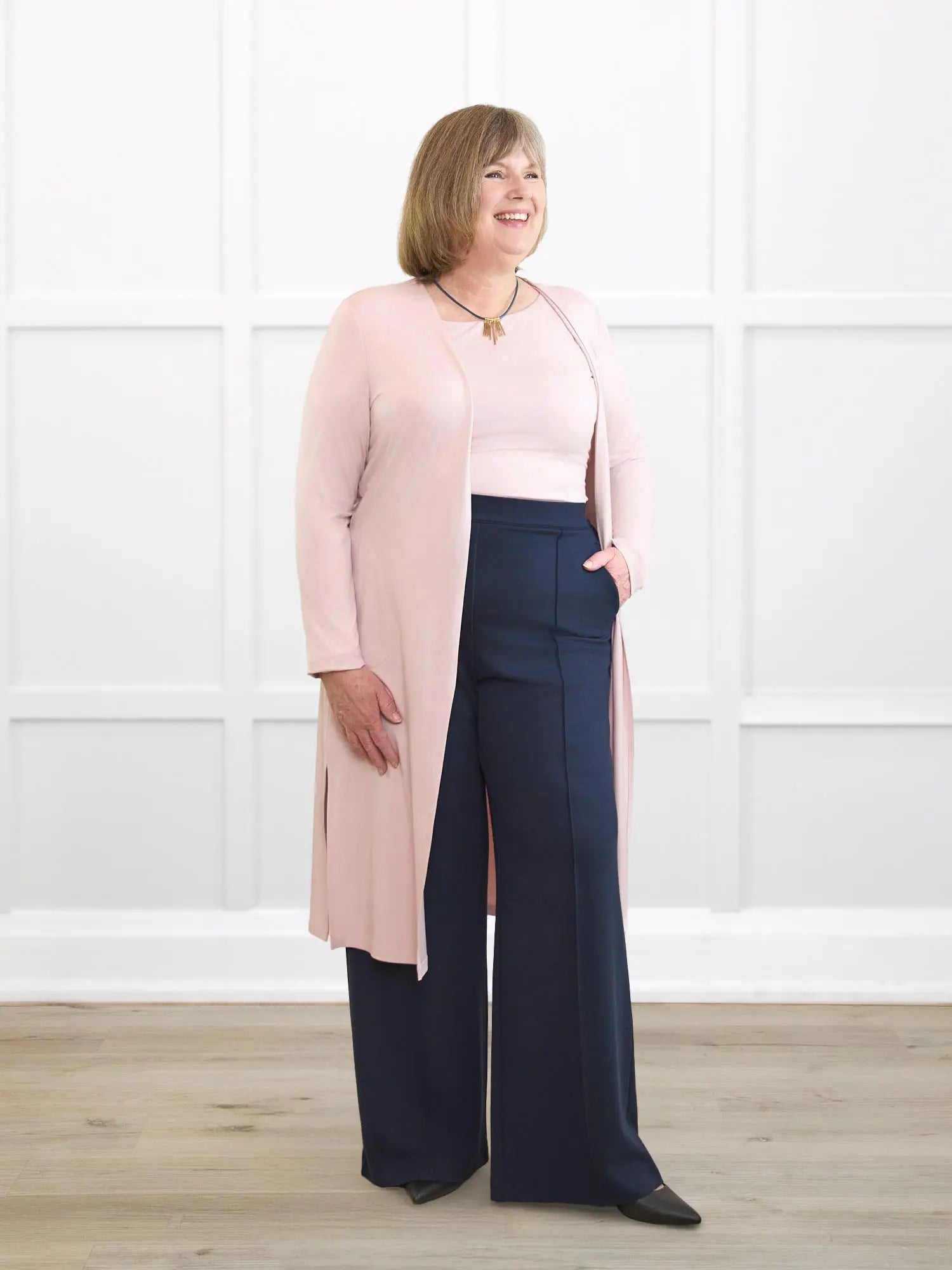 Larissa duster cardigan with pockets for women in Ballet pink on model Laurie, size XL Regular @Laurie-XL-regular