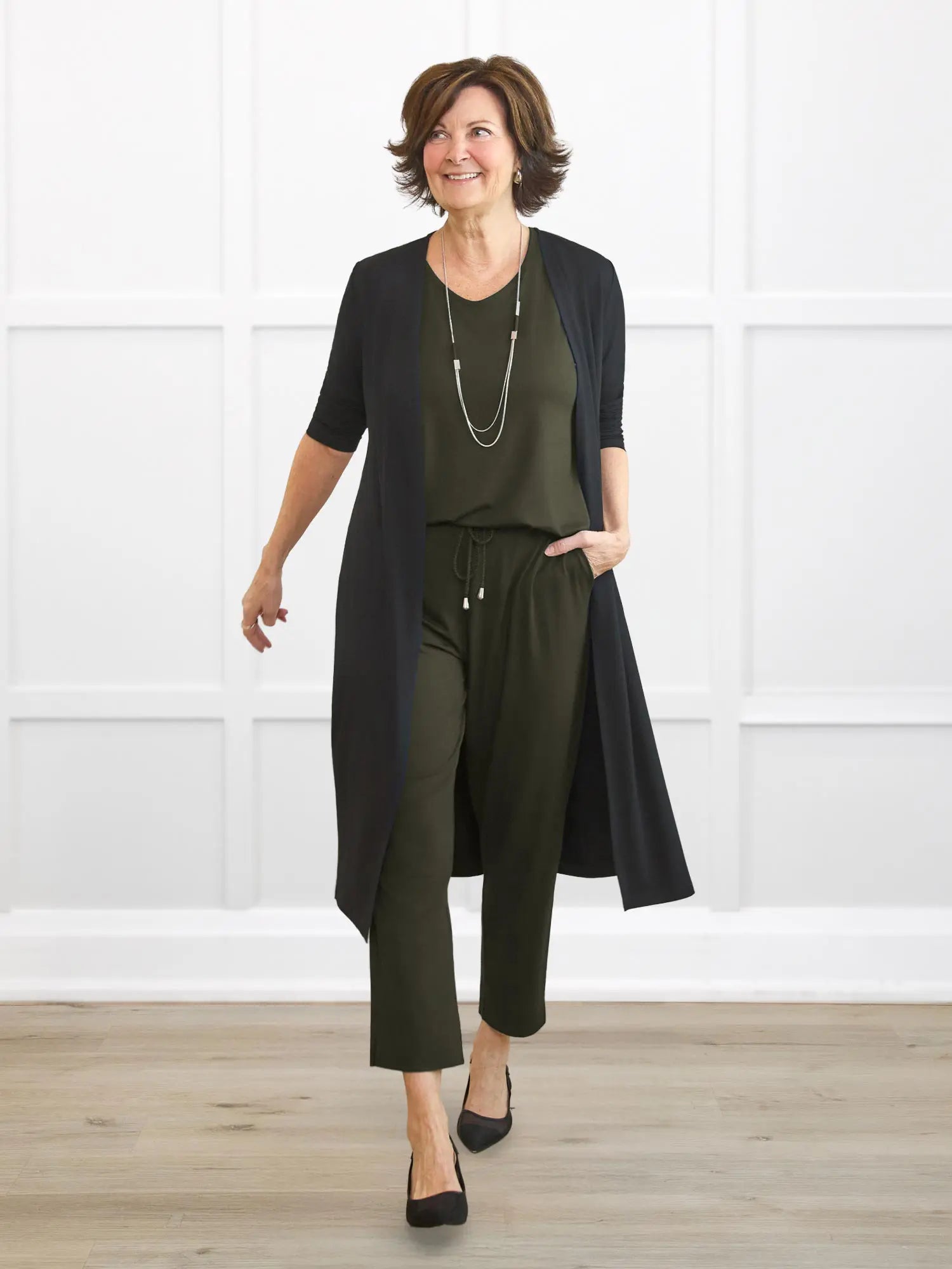 Larissa duster cardigan with pockets for women in Black on model Donna, size S Regular @Donna-S-regular