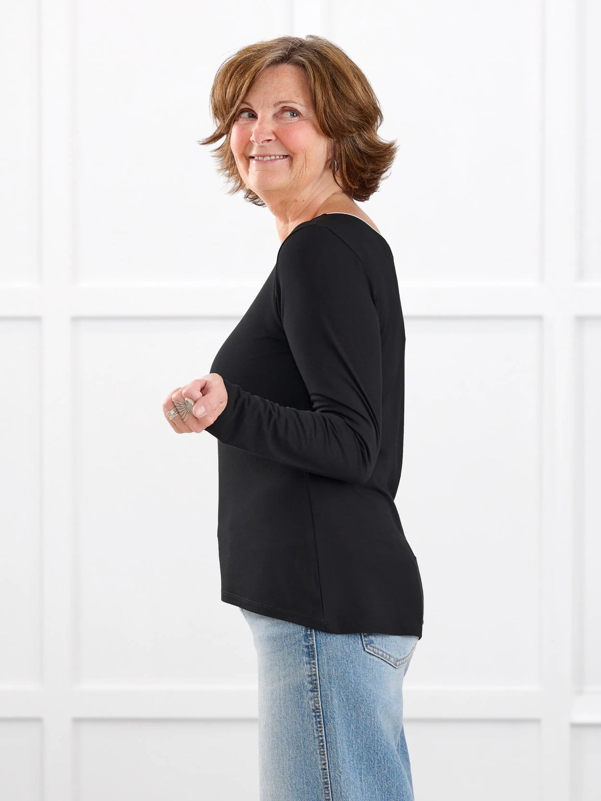 Liv v neck long sleeve top for women in Black white on model Donna, size S Regular @Donna-S-regular