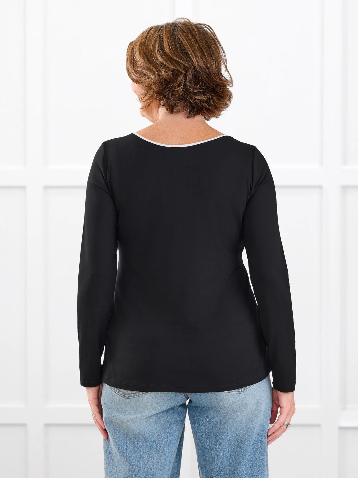 Liv v neck long sleeve top for women in Black white on model Donna, size S Regular @Donna-S-regular