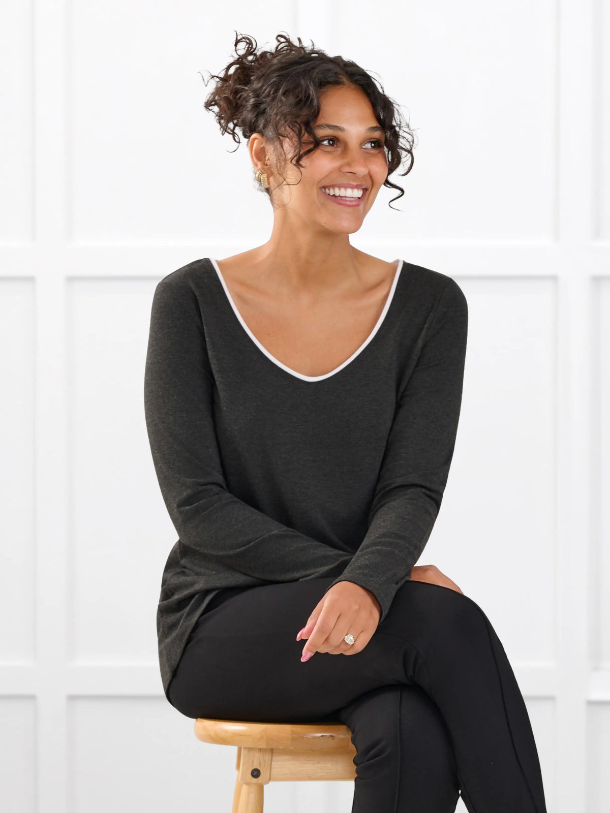 Liv v neck long sleeve top for women in Charcoal white on model Meron, size XS Regular @Meron-XS-regular