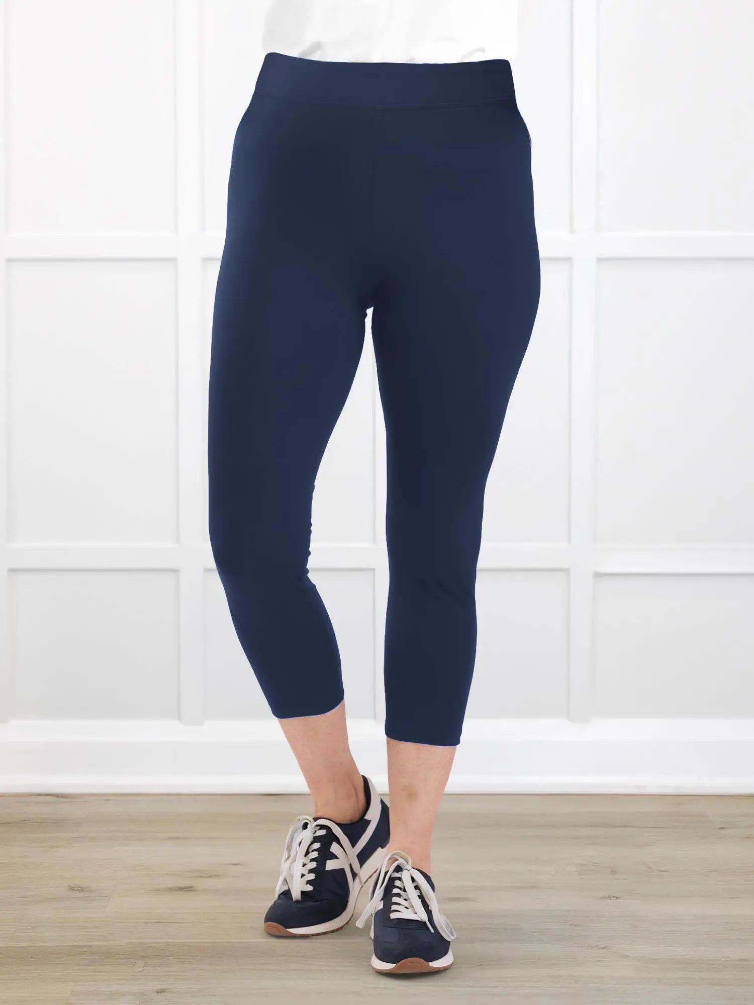 Lucy mid rise capri legging for women in Navy