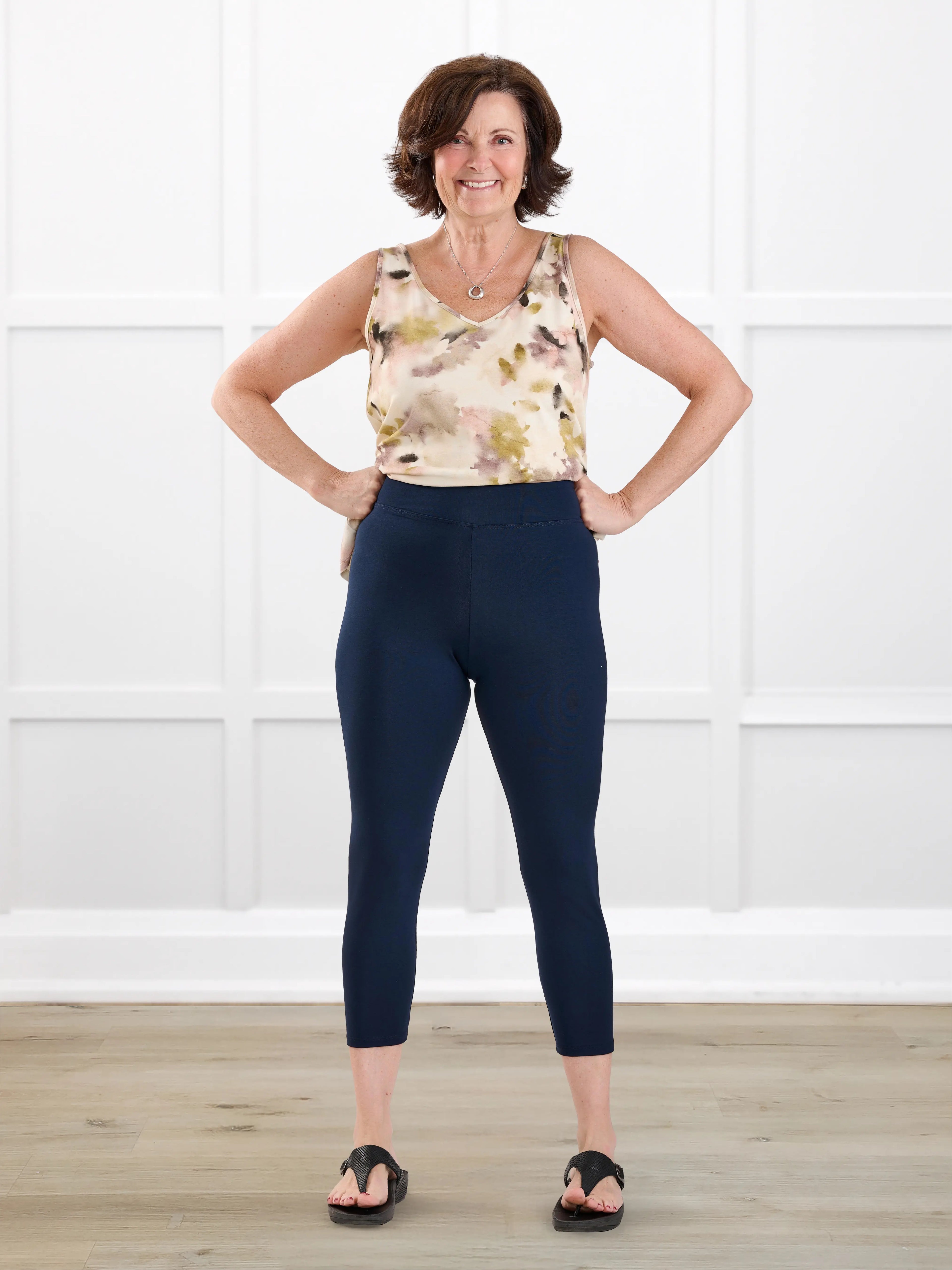 Lucy mid rise capri legging for women in Navy on model Donna, size S @Donna-S