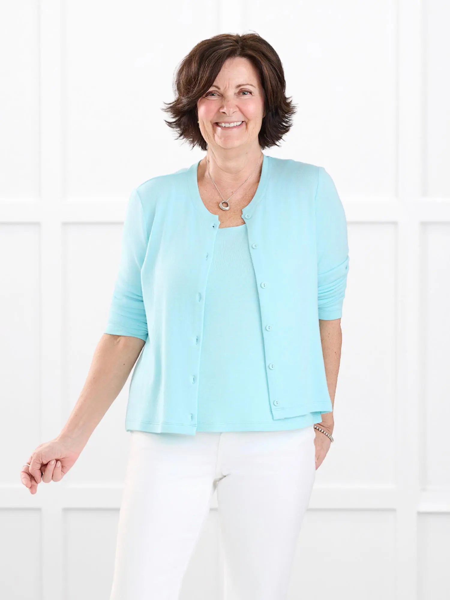 Maribel crewneck sweater knit cardigan in Fiji blue on model Donna, size S @Donna-S