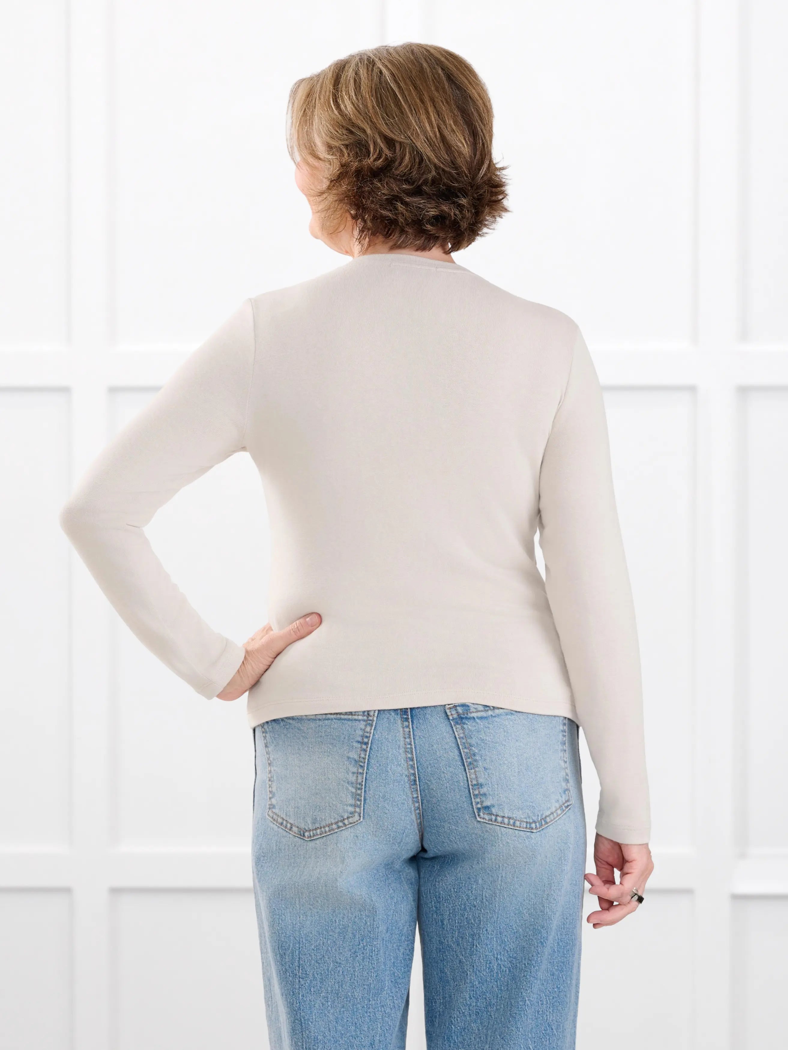 Maribel crewneck sweater knit cardigan for women in Seashell on model Donna, size S @Donna-S