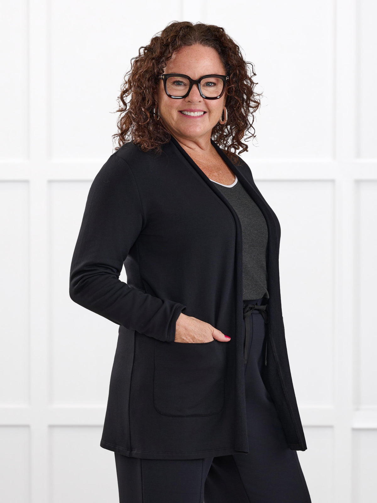 Montana fleece pocket cardigan for women in Black on model Kerri, size M Petite @Kerri-M-petite