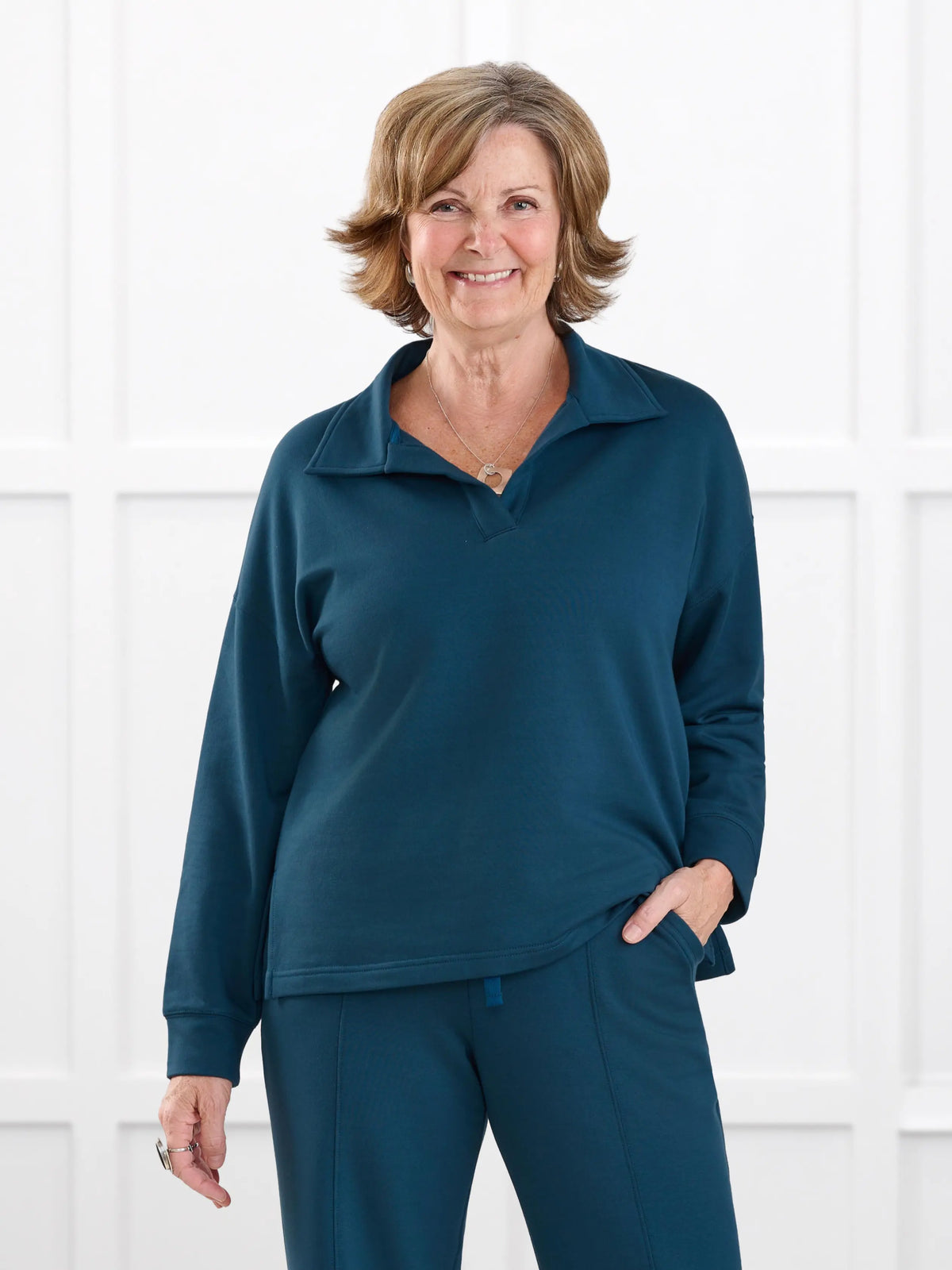 Odell fleece polo sweatshirt for women in Atlantic on model Donna, size S Regular @Donna-S-regular