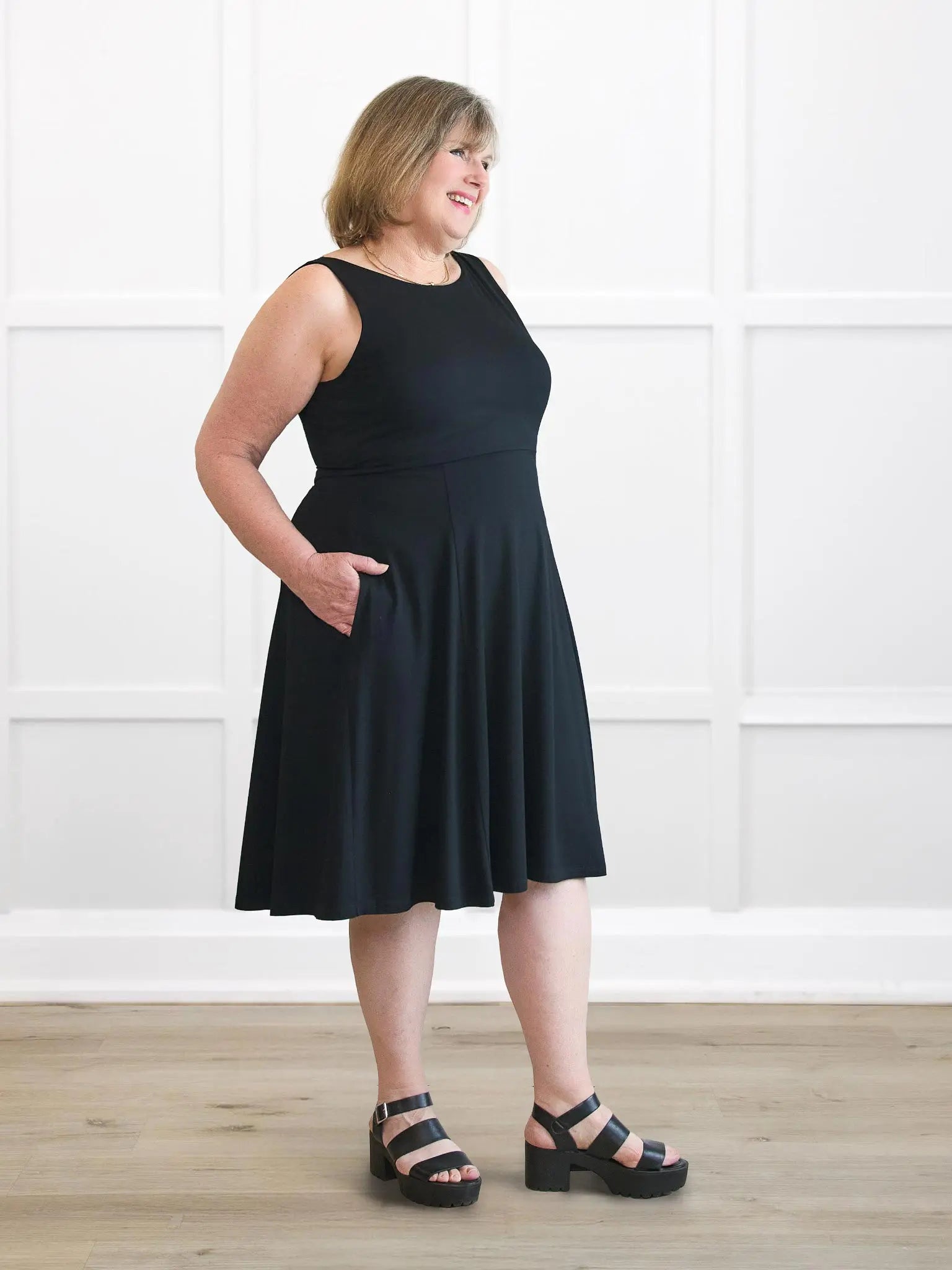 Rae reversible neckline knee length dress for women in Black on model Laurie, size XL @Laurie-XL