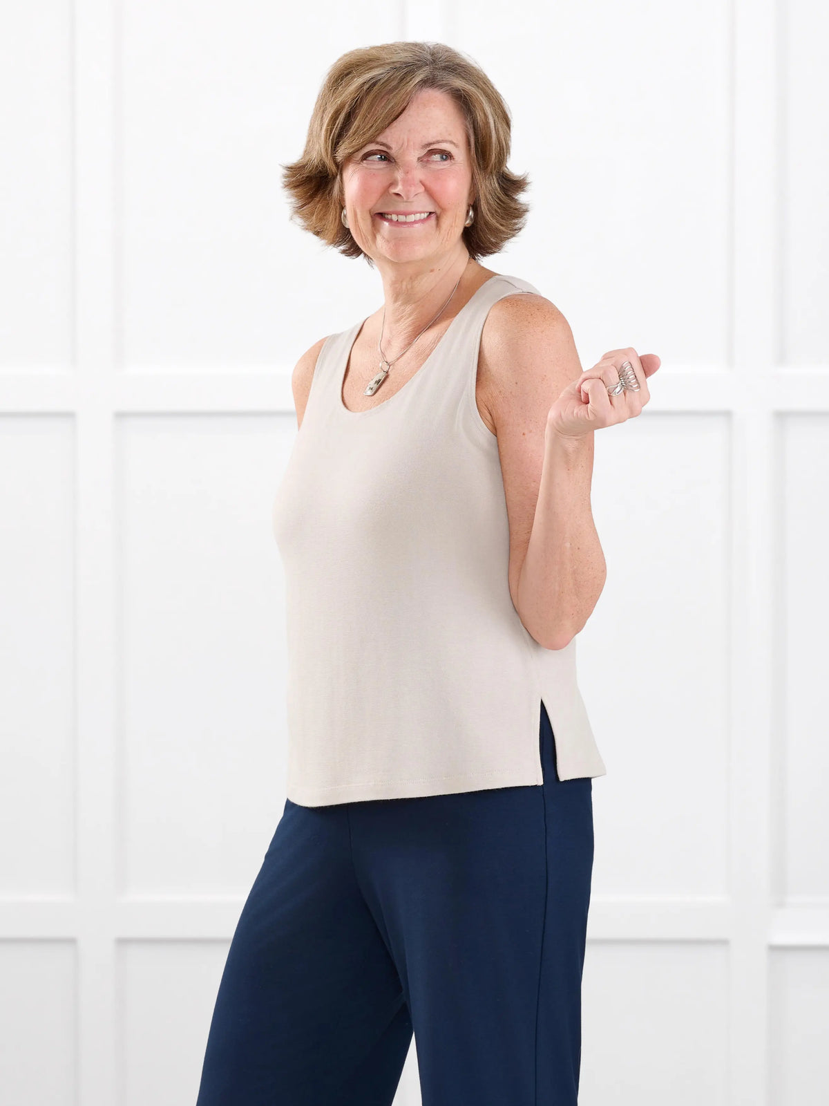 Ricki reversible neckline sweater knit tank for women in Seashell on model Donna, size S @Donna-S