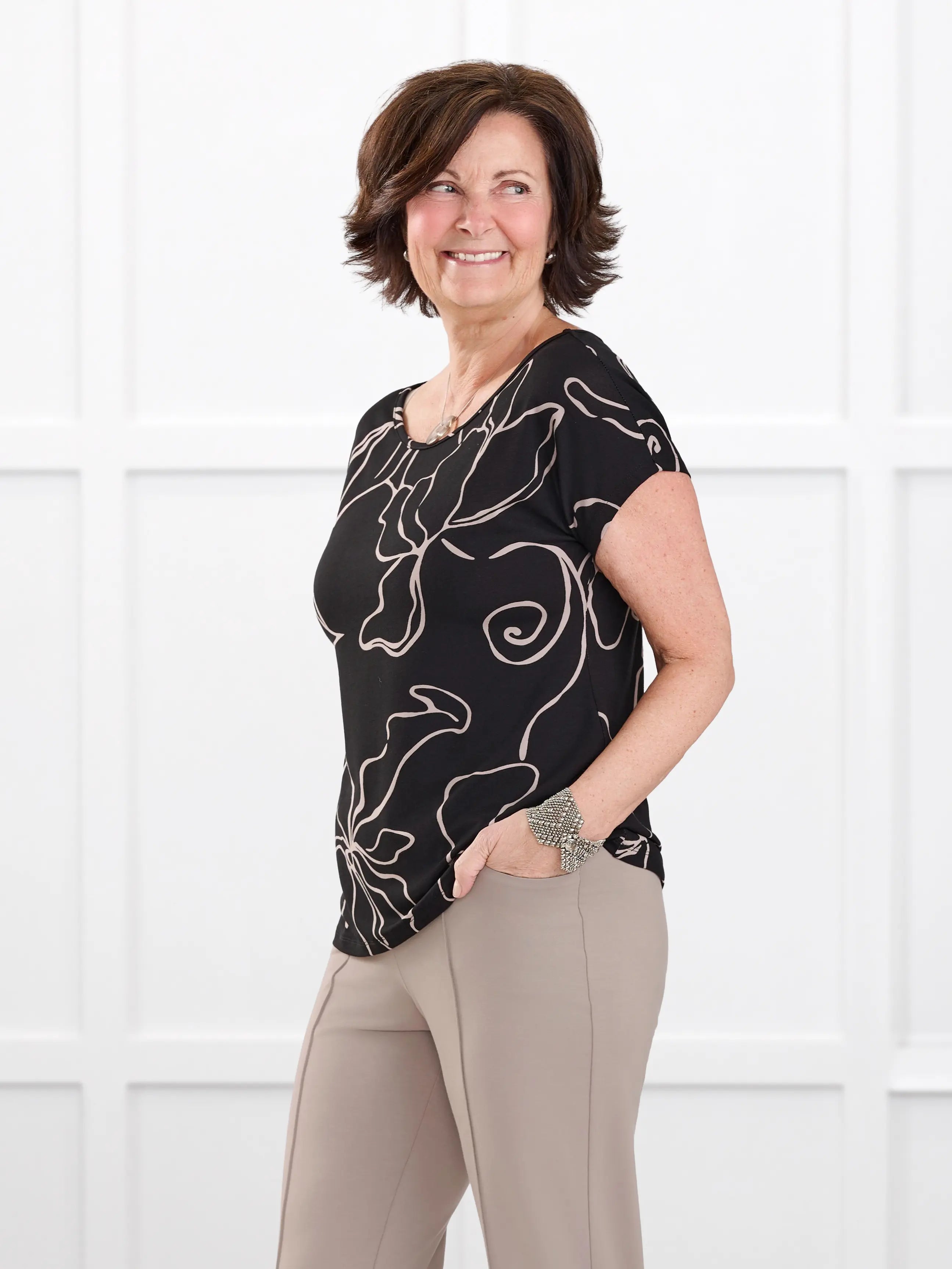 Rio reversible neckline dolman tee in Contour floral on model Donna, size S @Donna-S