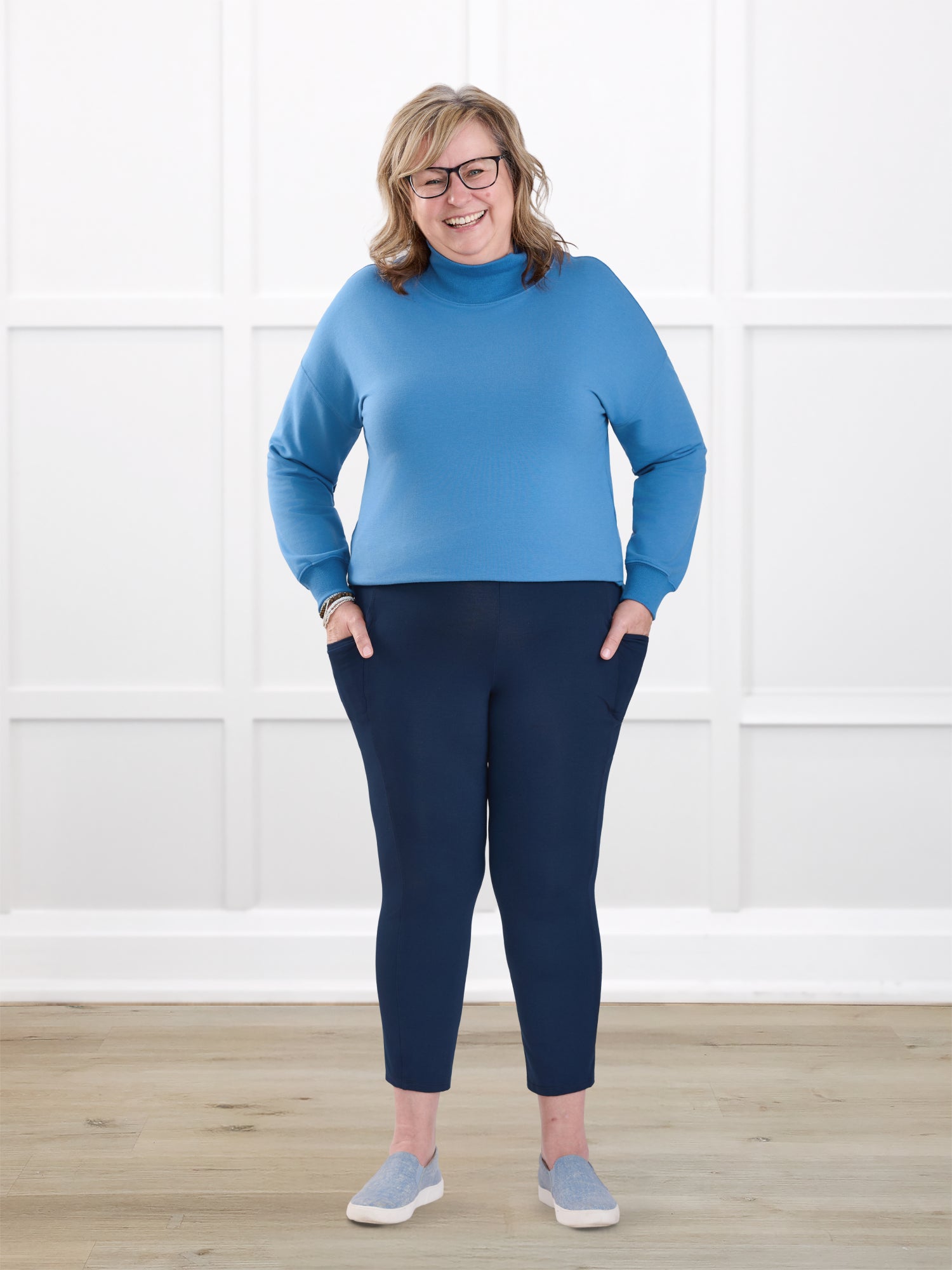 Seana high waisted pocket capri legging for women in Navy on model Deb, size XL @Deb-XL