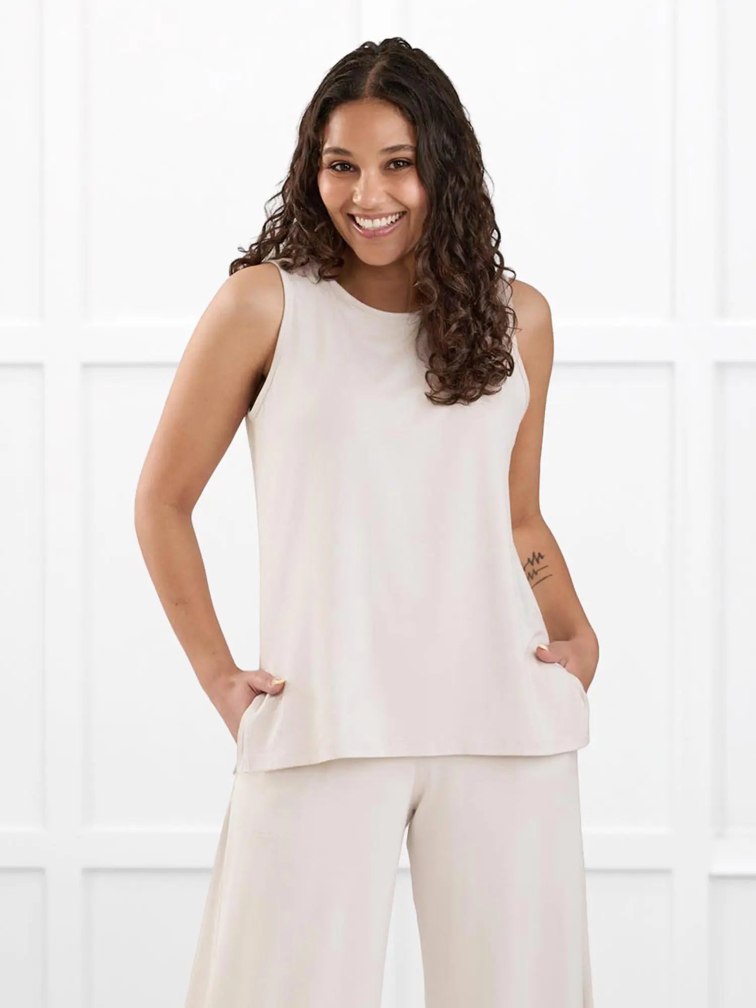 Shyanne reversible neckline side slit tank for women in Sandstone on model Meron, size XS Regular @Meron-XS-regular