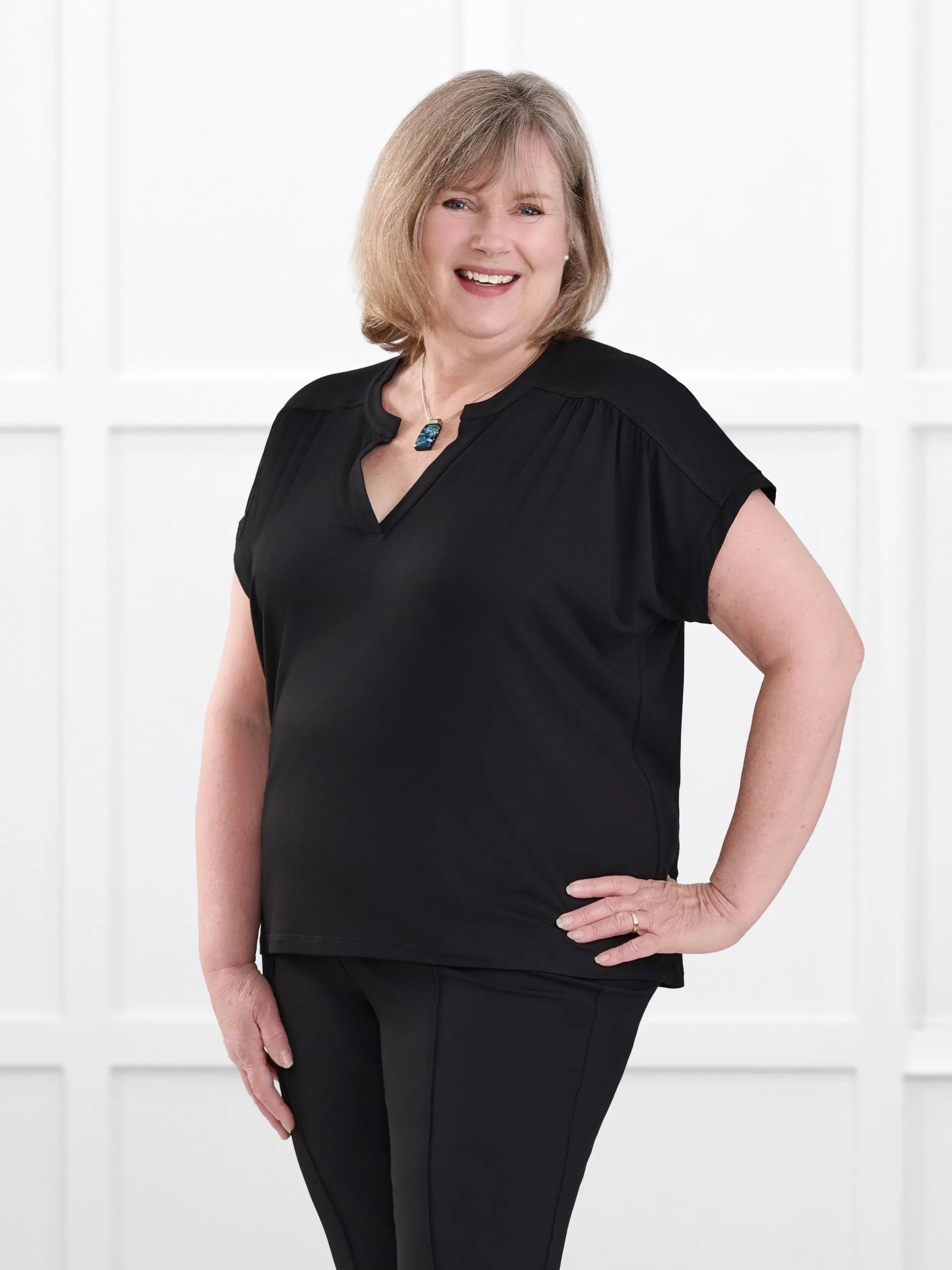 Triana ruched v neck dolman top for women in Black on model Laurie, size XL @Laurie-XL