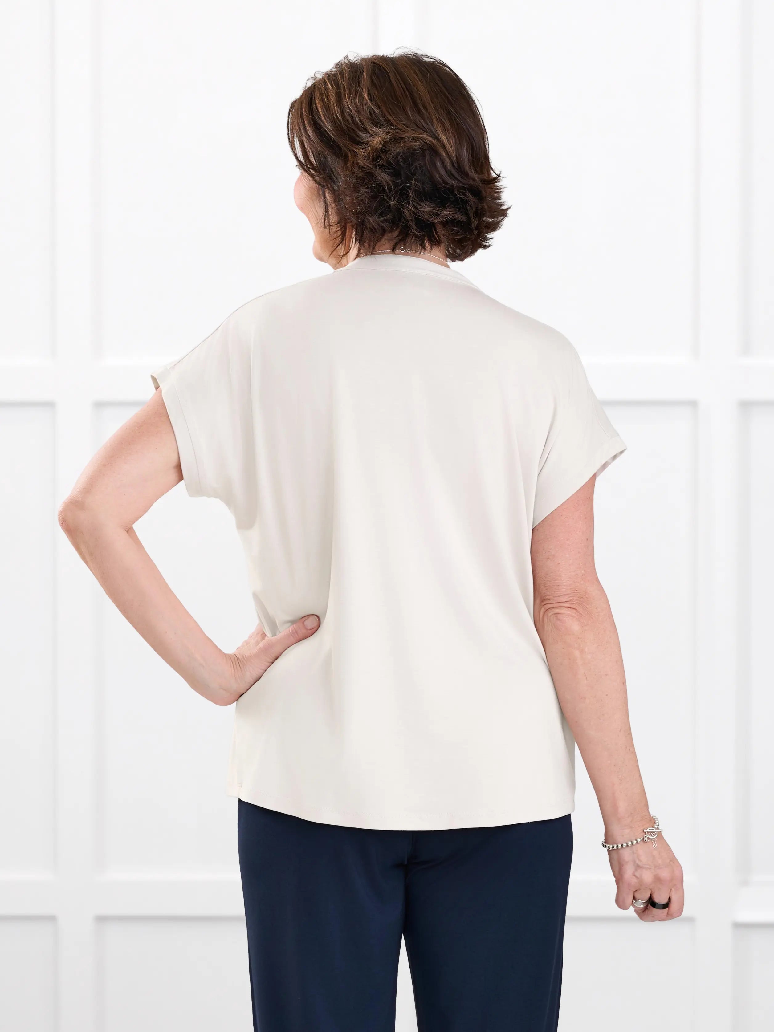 Triana ruched v neck dolman top for women in Sandstone on model Donna, size S @Donna-S