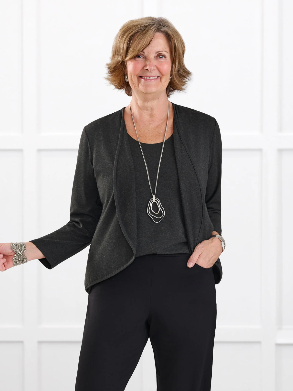 Wesley cropped waterfall cardigan for women in Charcoal on model Donna, size S @Donna-S