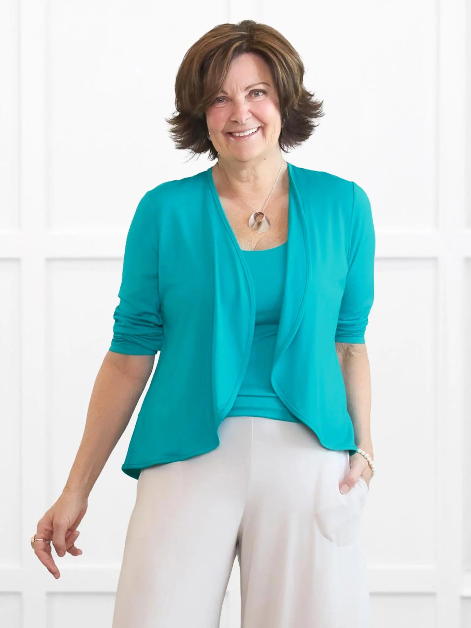 Wesley cropped waterfall cardigan for women in Sea glass on model Donna, size S @Donna-S