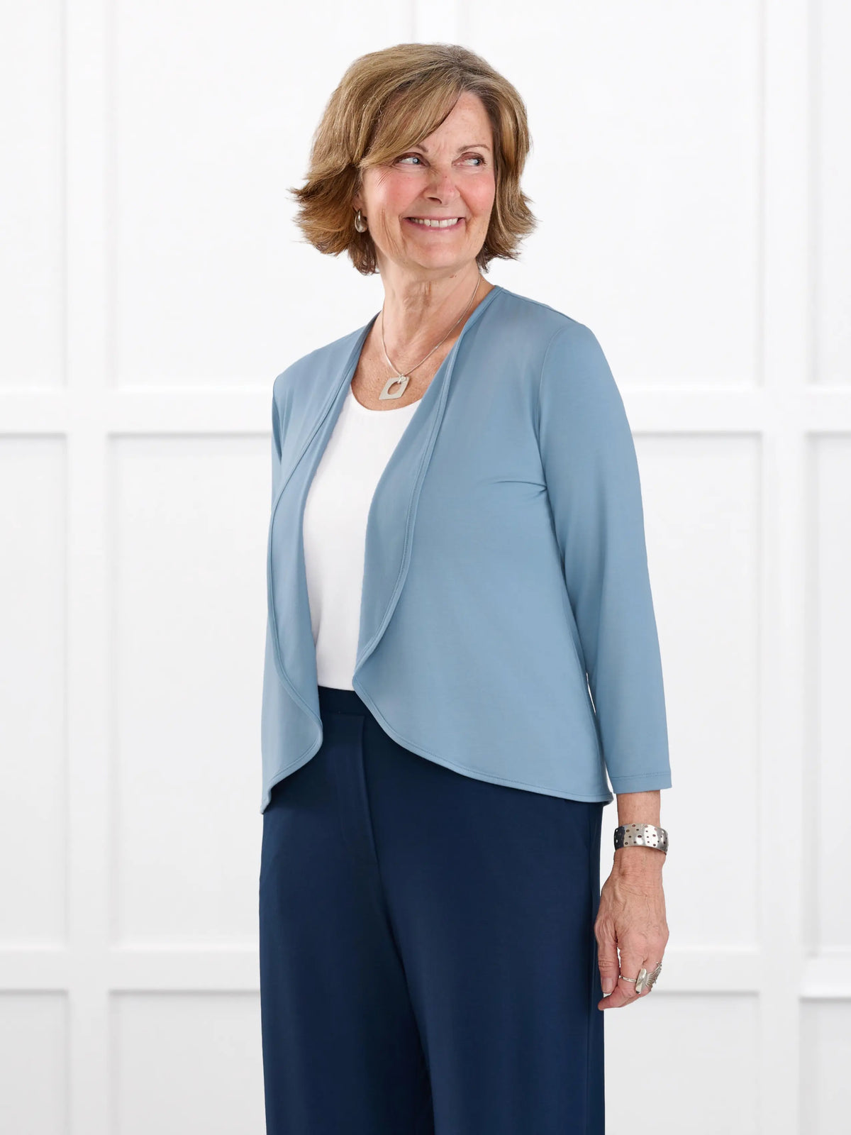 Wesley cropped waterfall cardigan for women in Steel blue on model Donna, size S @Donna-S