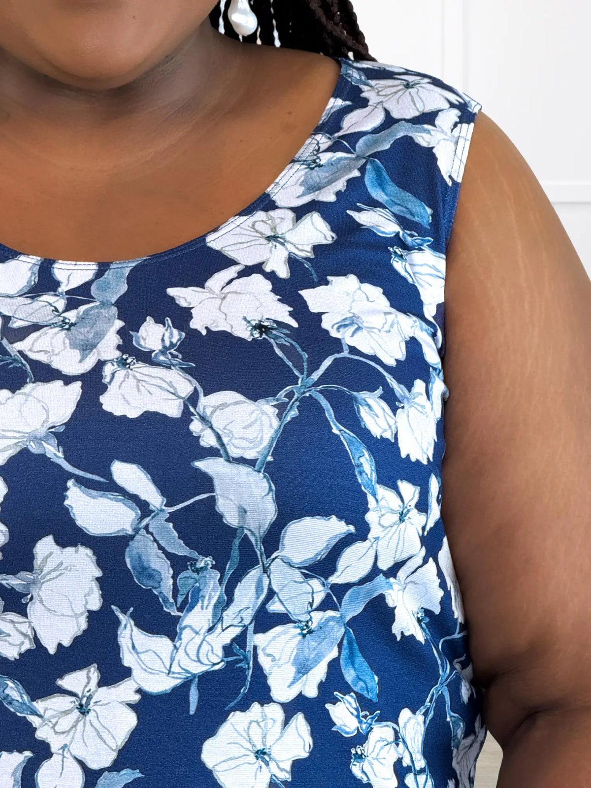 A closeup detail of the neckline of Miik&