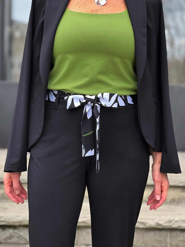 A close up image of Miik's Blair bamboo tie waist belt in white lily