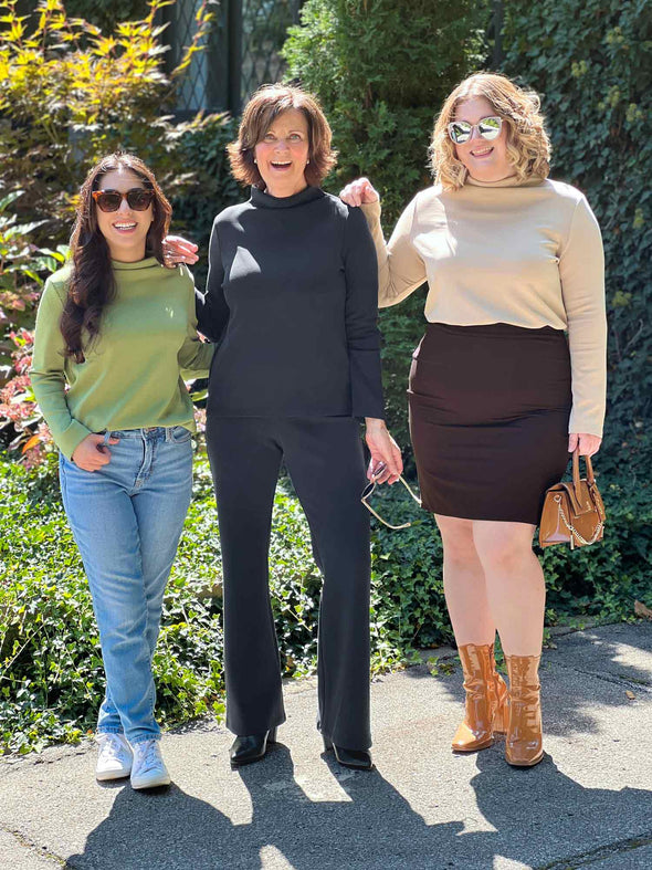 Miik model Yasmine, Donna and Bri all wearing Miik's Breda funnel neck long sleeve top in the three colours available: moss, graphite and wheat 