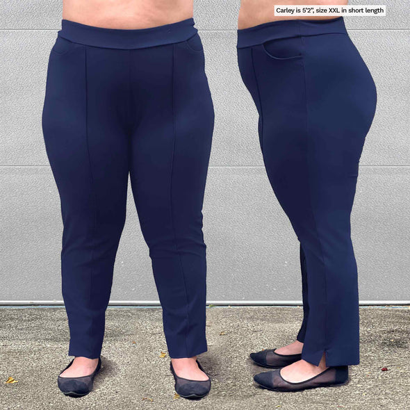 Close up of Miik's Christal pull-on pintuck ankle pant in short length in navy in front and side view shown on a 5'2" XXL model.