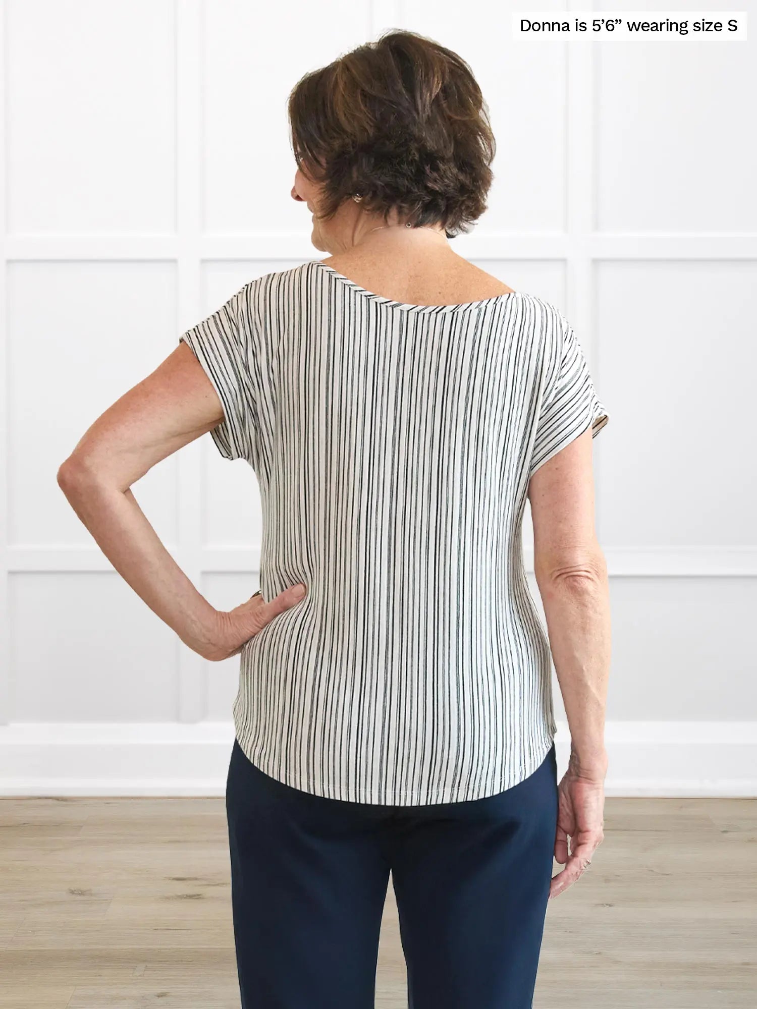 Miik founder Donna (5’6”, small) standing with her back towards the camera showing the back of Miik&