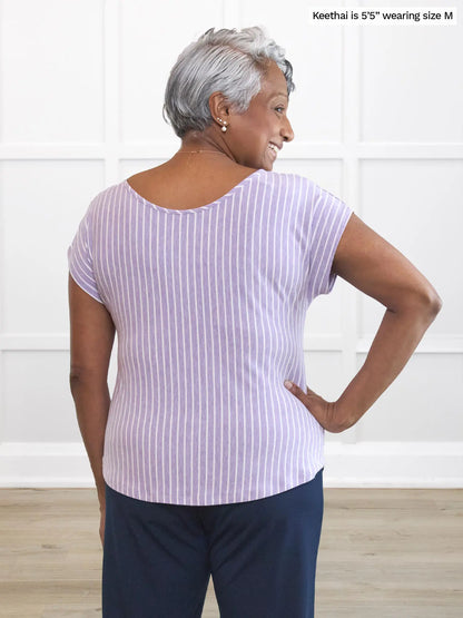 Miik model Keethai (5’5”, medium) standing with her back towards the camera showing the back of Miik&