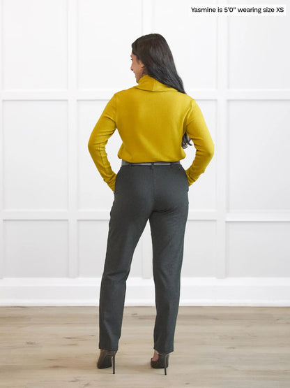 Miik model Yasmine (5’0”, xsmall) standing with her back towards the camera showing the back of Miik&