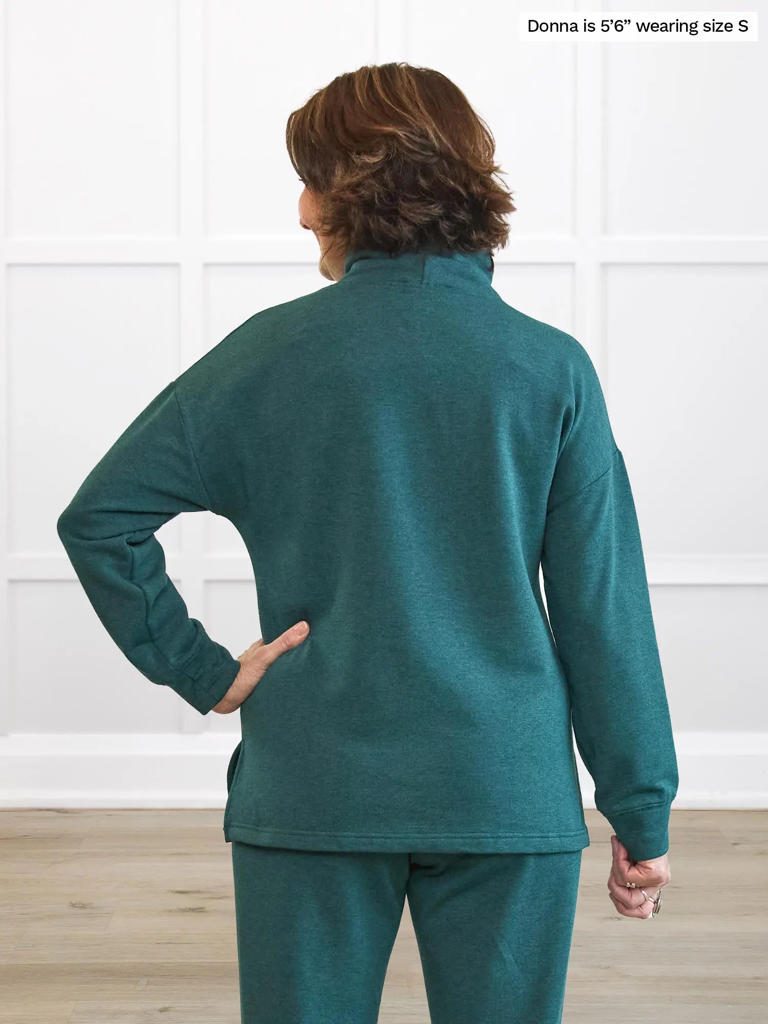 Miik founder Donna (5’6”, small) standing with her back towards the camera showing the back of Miik&