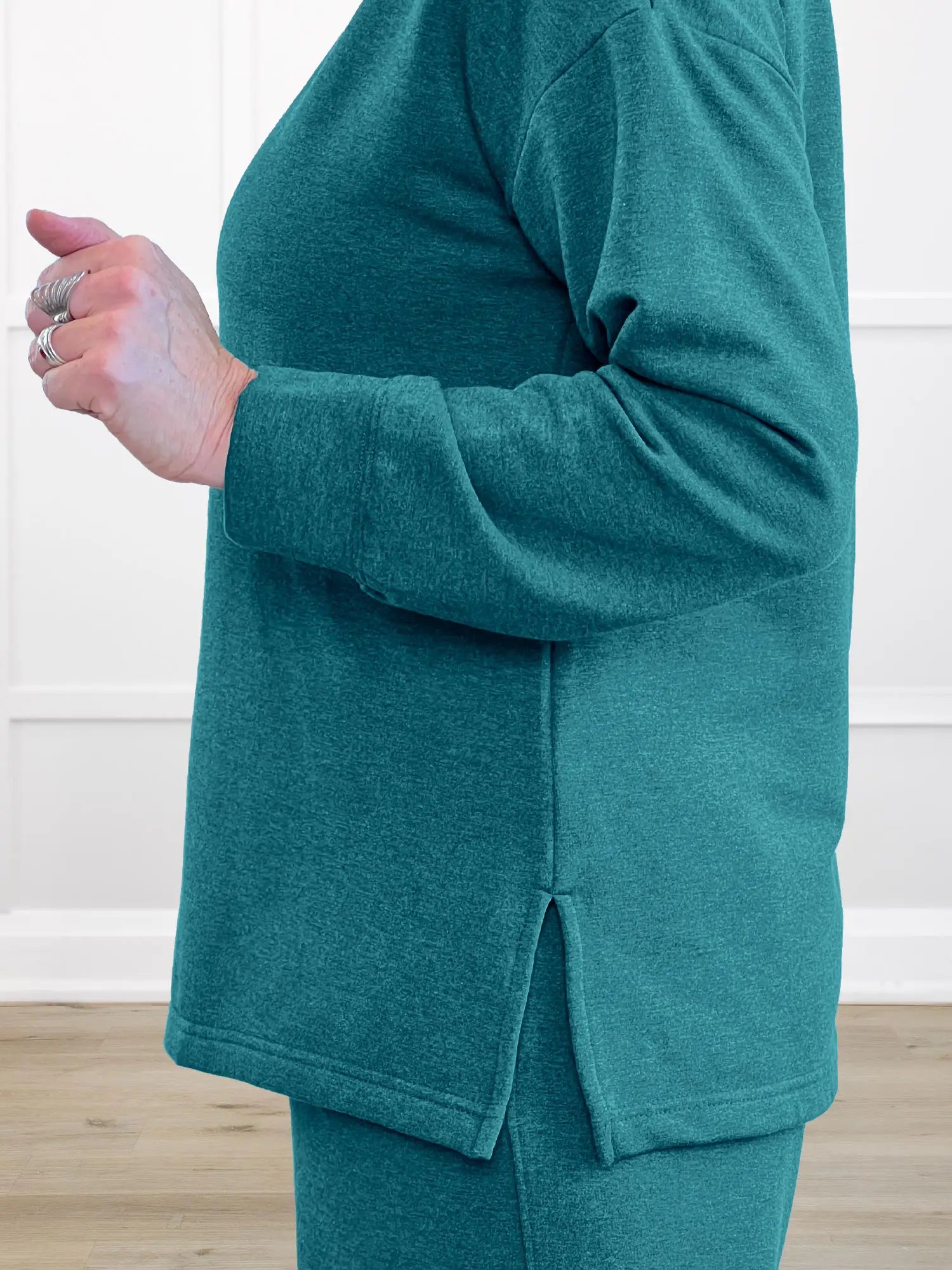 A closeup detail shot of the side slit of Miik&