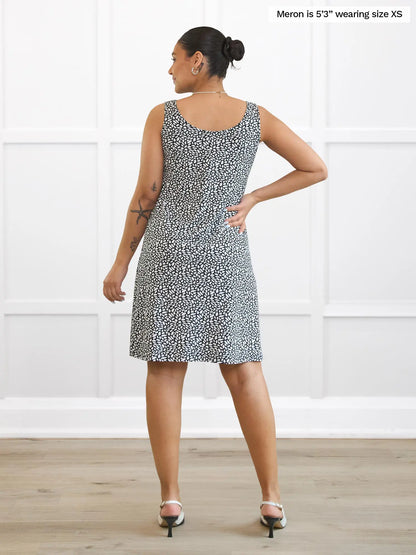 Miik model Meron (5’3”, xsmall) standing with her back towards the camera showing the back of Miik&