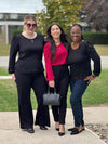 Miik models Bri, Yasmine and Marilyn laughing all wearing Miik's Janette puff sleeve reversible blouse in black and red wine