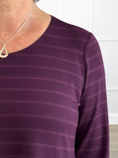 A closeup detail shot of the neckline of Miik&