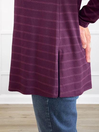 A closeup detail shot of the side slit of Miik&