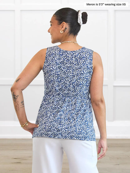 Miik model Meron (5’3”, xsmall) standing with her back towards the camera showing the back of Miik&