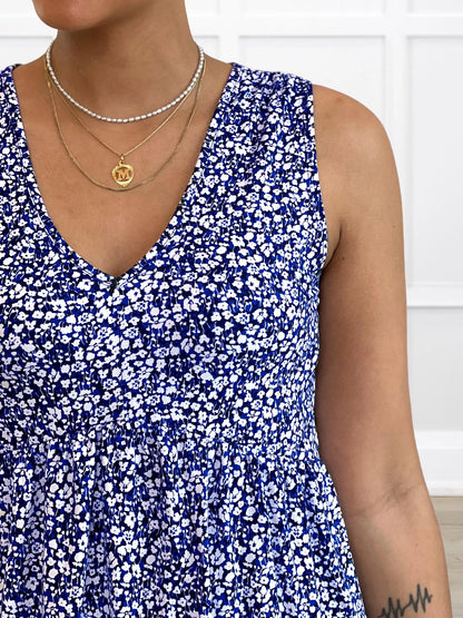 A closeup detail of the neckline of Miik&