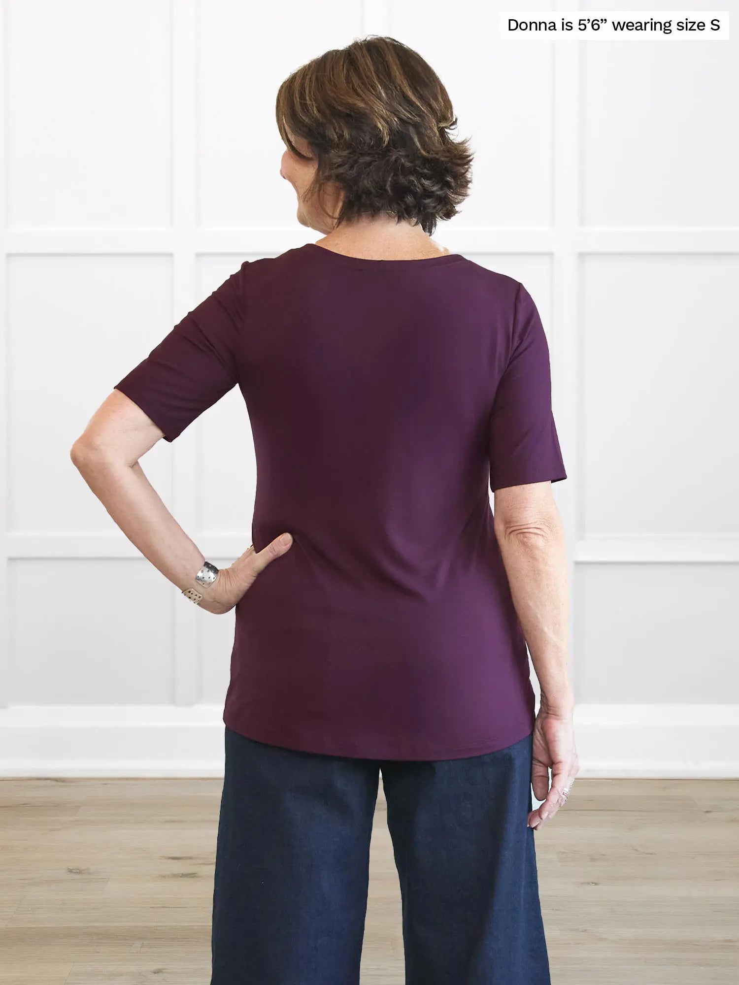 Miik founder Donna (5’6”, small) standing with her back towards the camera showing the back of Miik&