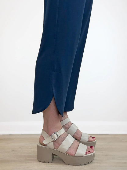 A closeup detail shot of the bottom hem of Miik&