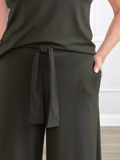 A closeup detail shot of the waist and pocket of Miik&