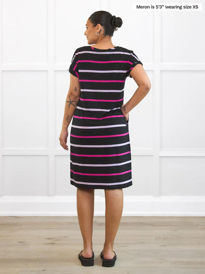 Miik model Meron (5’3”, xsmall) standing with her back towards the camera showing the back of Miik&